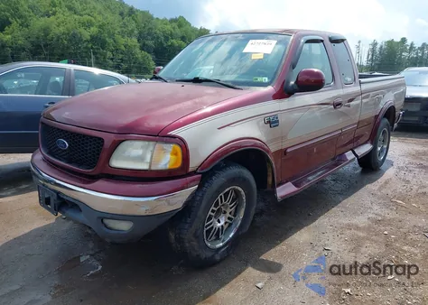 1999 Ford F-150 Lariat/Xl/Xlt z USA, uszkodzony, nr VIN 2FTRX18L7XCA86031